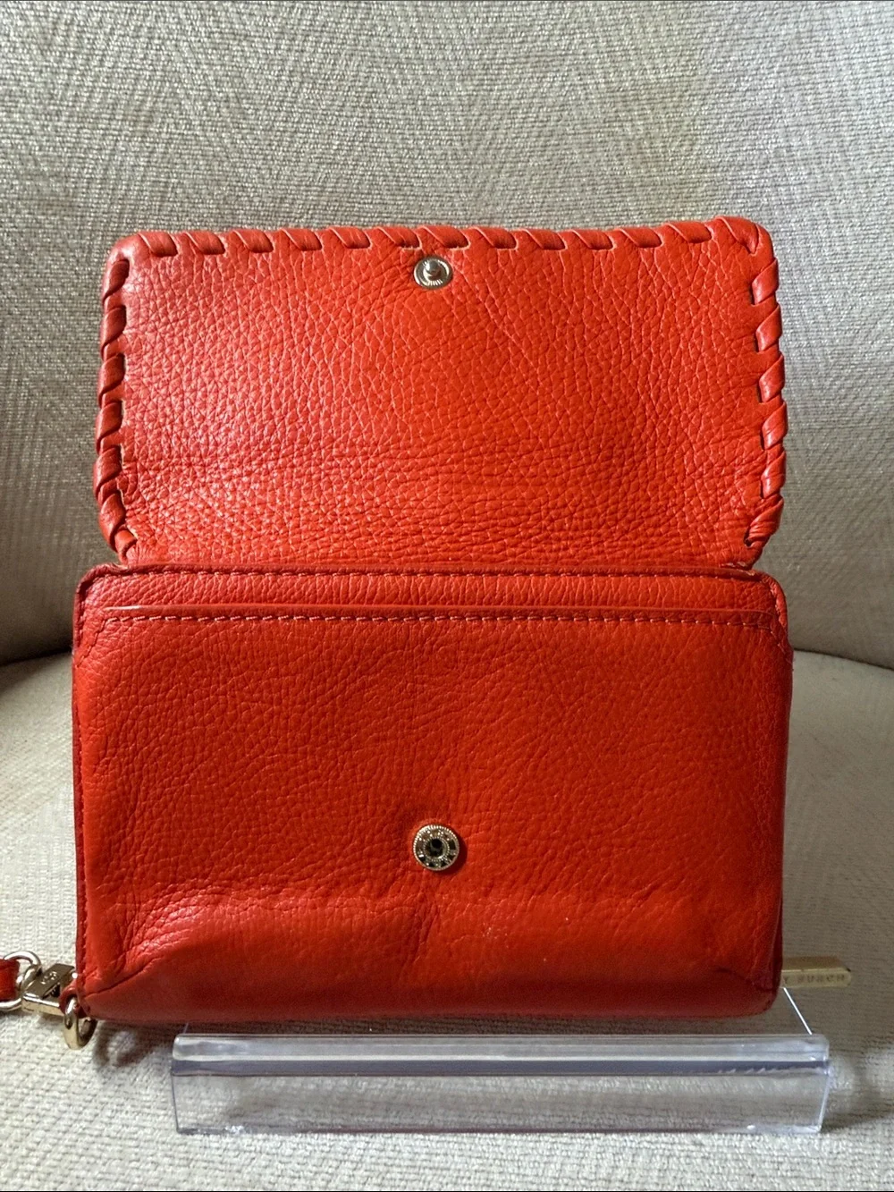 Tory Burch Orange Leather Wristlet with Logo Medallion